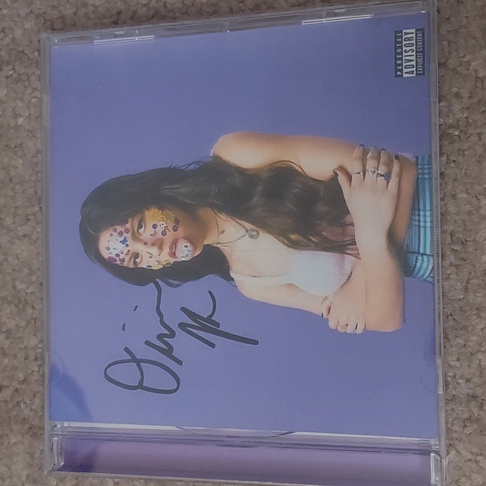 Olivia Rodrigo sour signed cd